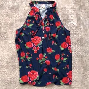 Womens floral tank top blouse. Size large. Nice polyester material.